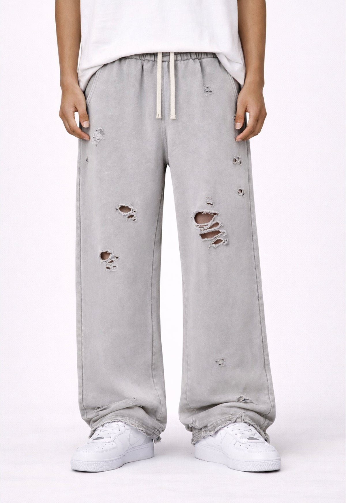 GREY DESTROYED SWEATPANTS